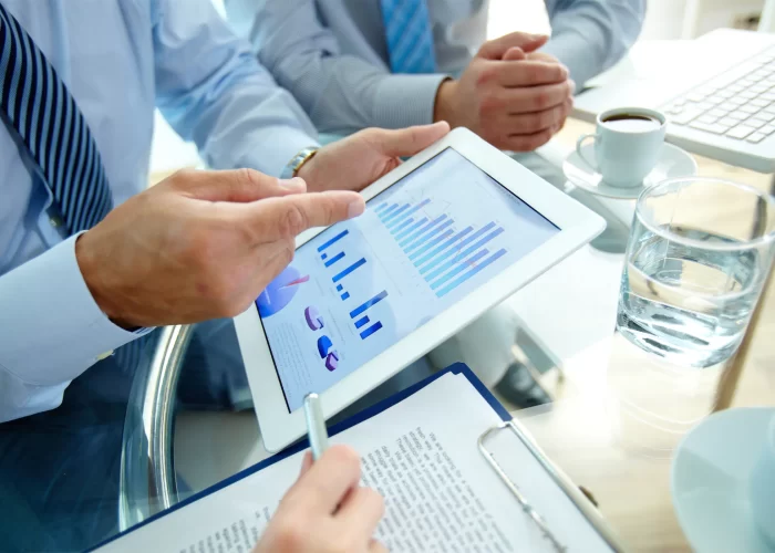 close-up-executive-pointing-graph